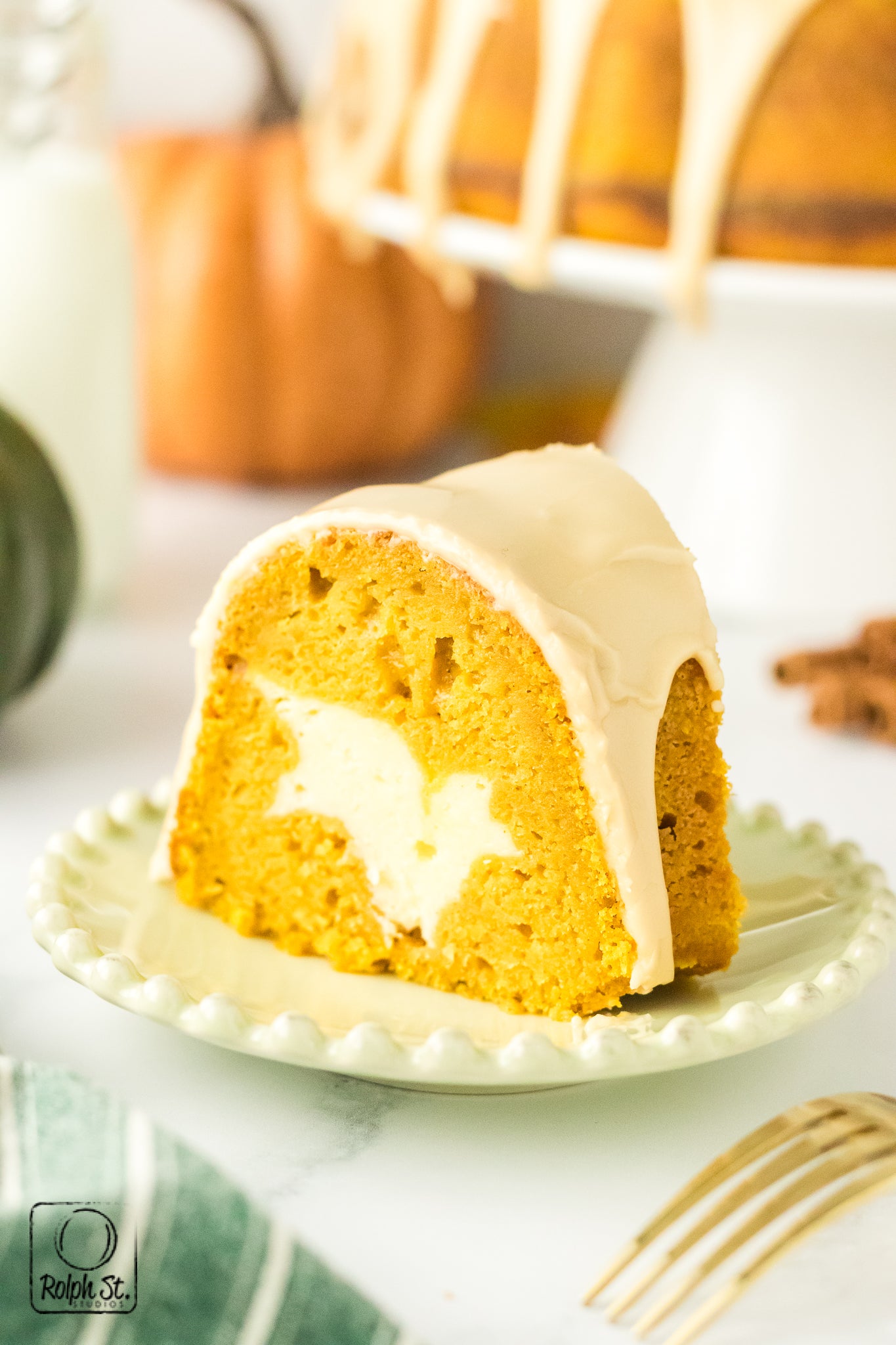 Exclusive Pumpkin Cheesecake Bundt Cake with Maple Glaze