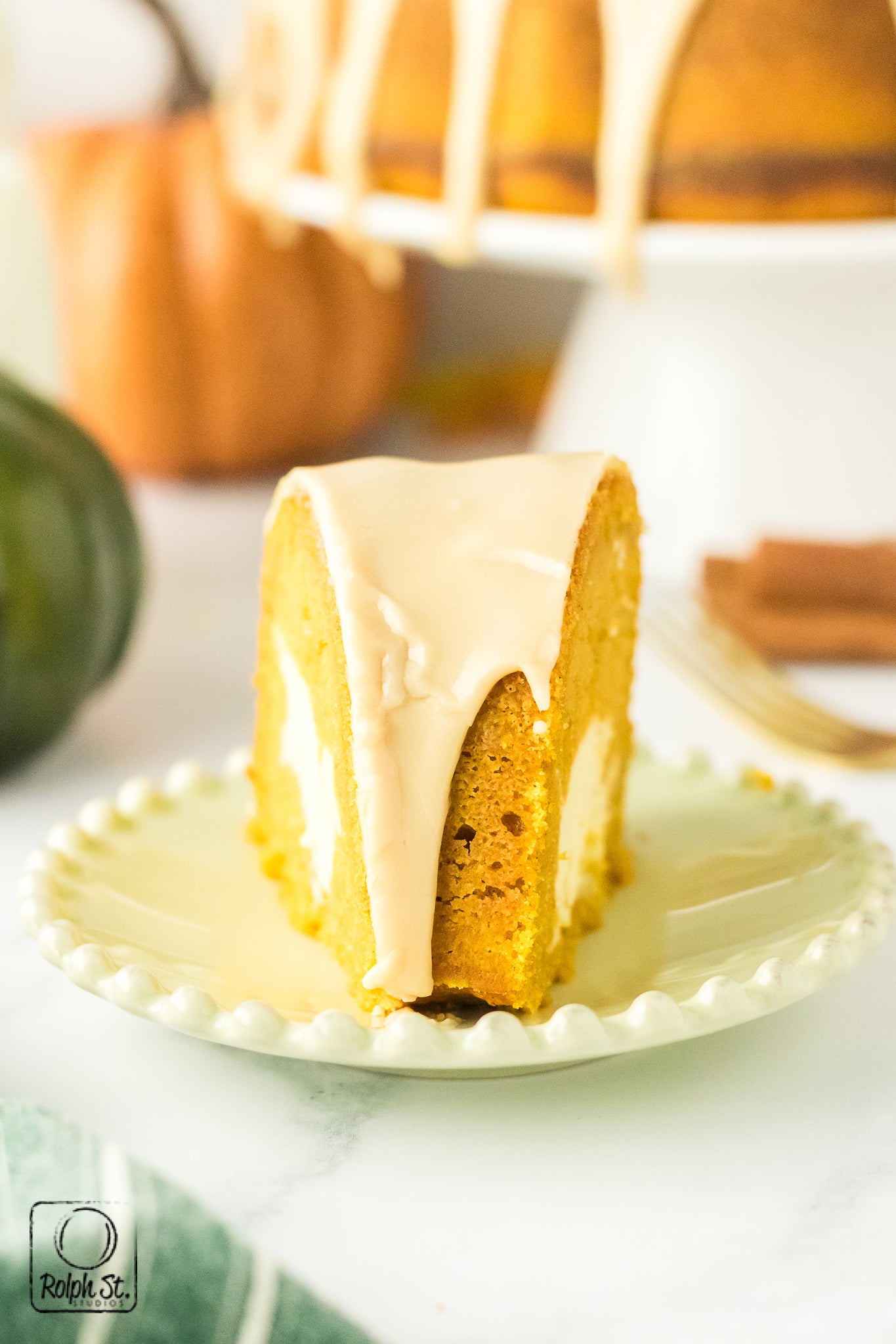 Exclusive Pumpkin Cheesecake Bundt Cake with Maple Glaze